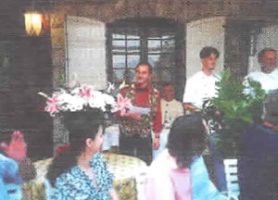 The head waiter, Roget and staff welcoming PEMC members